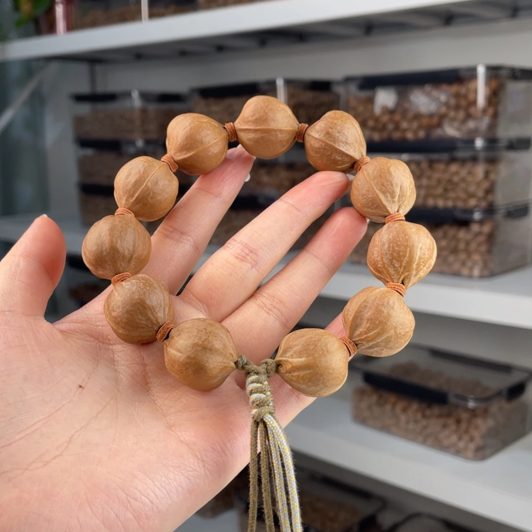 呵***呵橄榄核手串/手链22.5 24梅林铁核