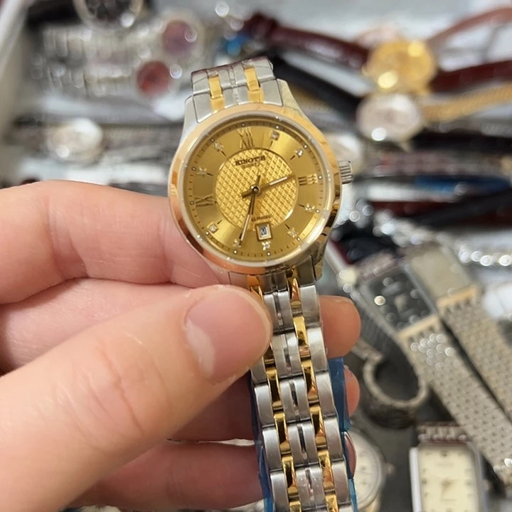 阳****钢牛皮（革）钢石英机芯