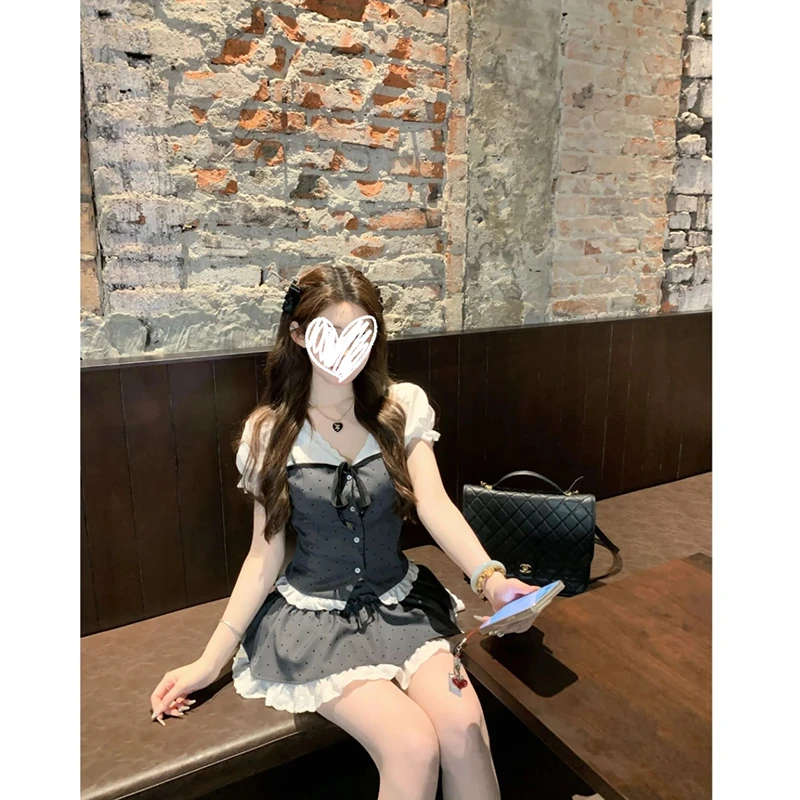 【坠入秘境】假两件蝴蝶结拼接收腰上衣显瘦波点短裙时尚套装