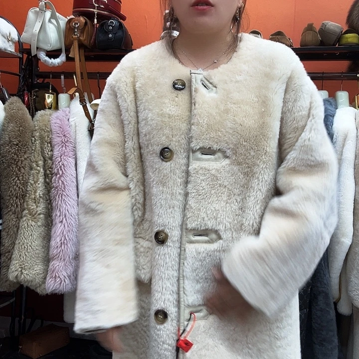 羊皮（革）皮毛一体的设计风格与传统