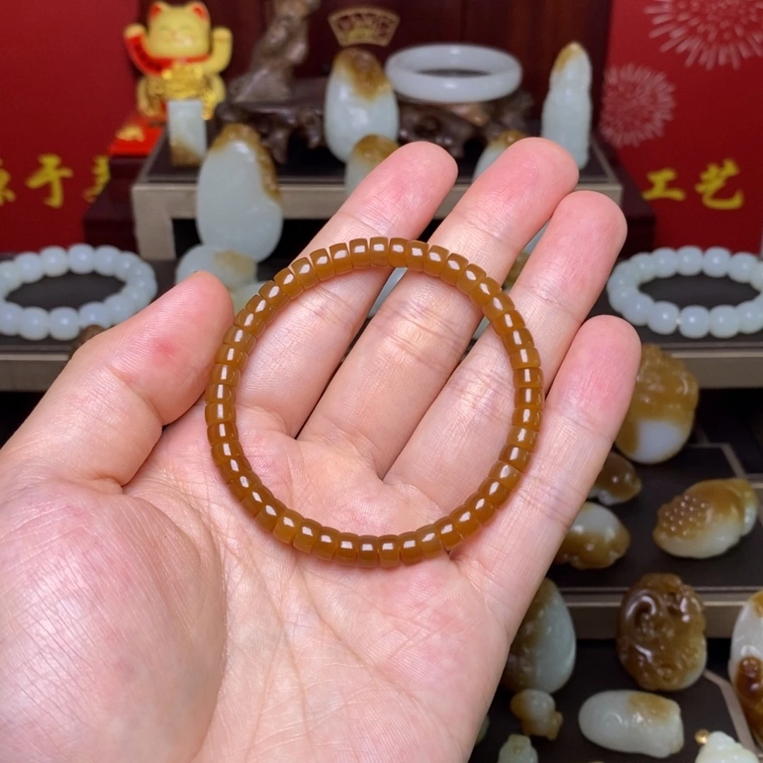 猫***冬手串未镶嵌和田玉(糖玉)且末金山糖手串