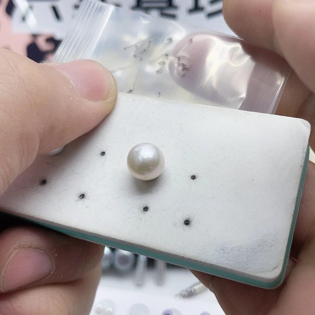 舒***蕾淡水珍珠银S925镶嵌耳饰