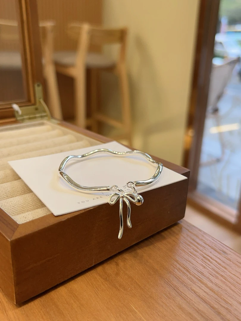 足银手镯 足银999蝴蝶结铃铛实心开口手镯女设计感高级轻奢手环