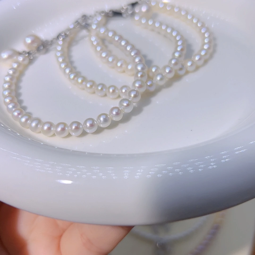 猫***药极光珍珠淡水珍珠钛钢