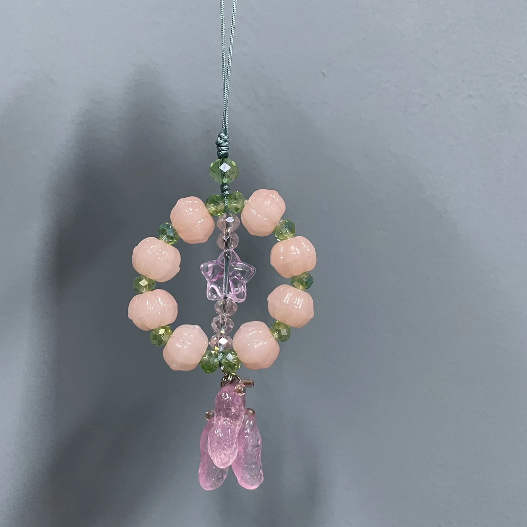 绳款编织粉色柿子款手机坠E879