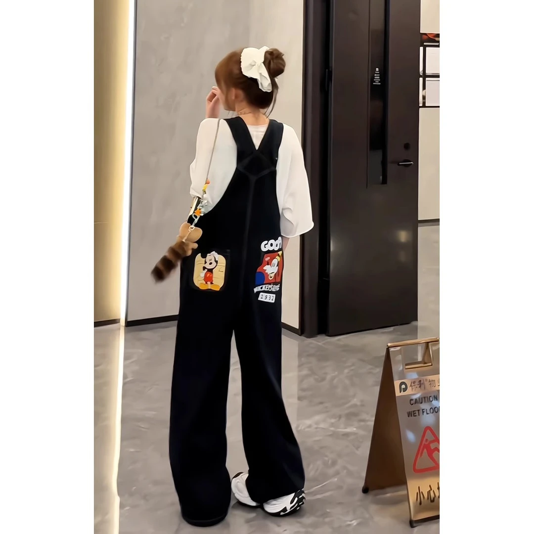 春夏季复古显高2025黑色卡通米老鼠图案牛仔背带裤女阔腿连体裤子