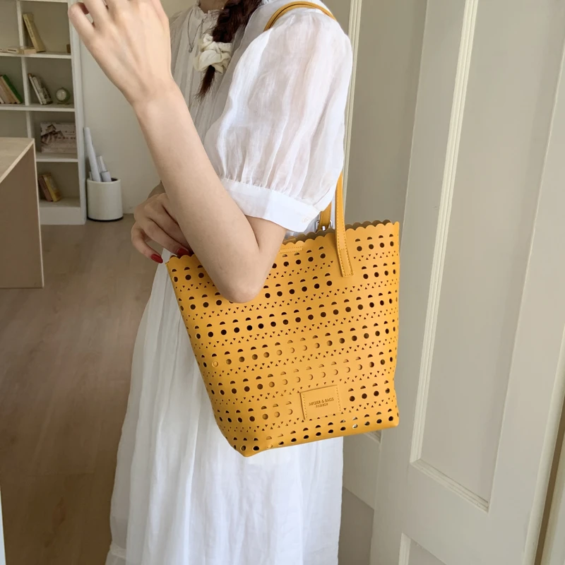 韩版镂空大容量包包女2025新款潮夏季托特包简约单肩腋下包7608