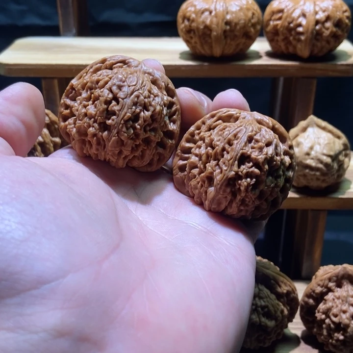 吊坠文玩核桃红皮球疆44微修