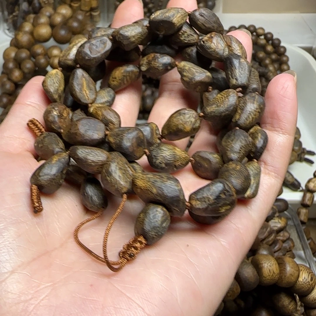 耳***君沉香手串多圈树丁包头老料沉水36克