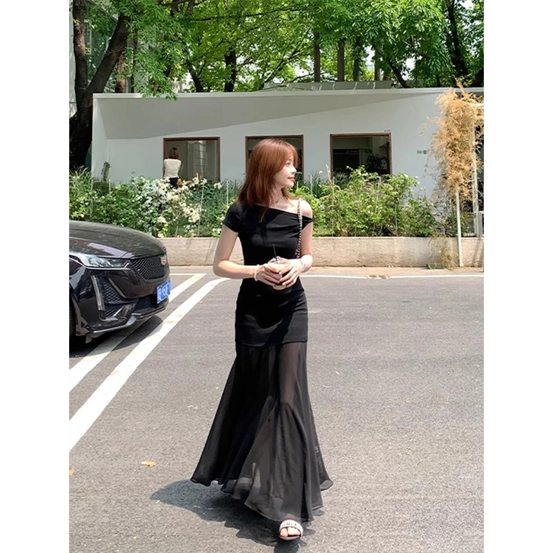 夏季新款气质显瘦设计感长款连衣裙法式黑色斜肩裙子修身网纱长裙
