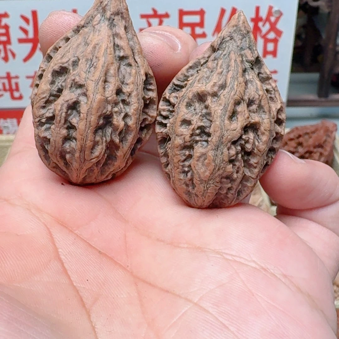 文玩核桃吊坠石中剑