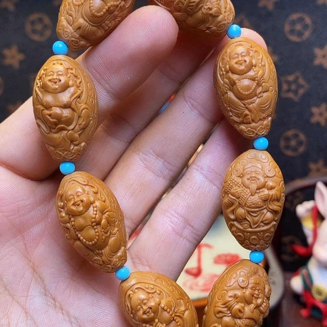 橄榄核吊坠nbnhjhhjjjnnnnjjj