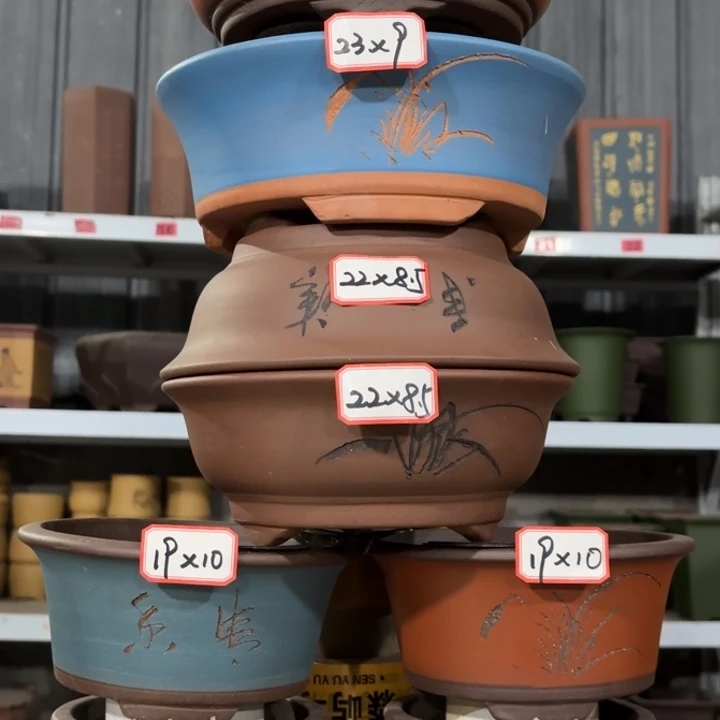 紫砂花盆100-8。