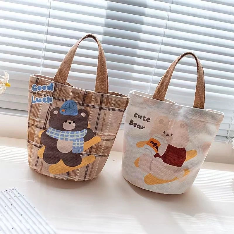 2024新款时尚卡通帆布手提水桶包宝妈便当袋学生外出上班青年可爱