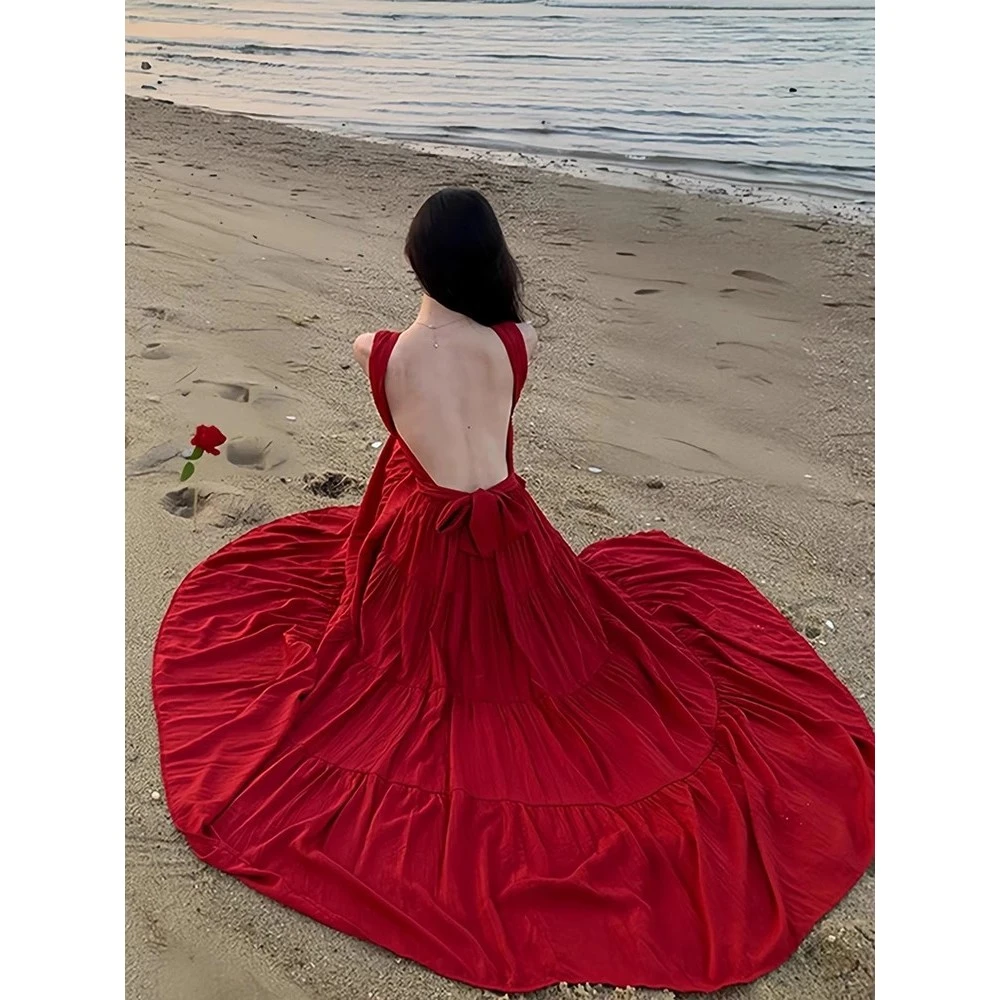 纯欲气质绑带挂脖连衣裙女春季新款修身显瘦不规则辣妹露背A字裙