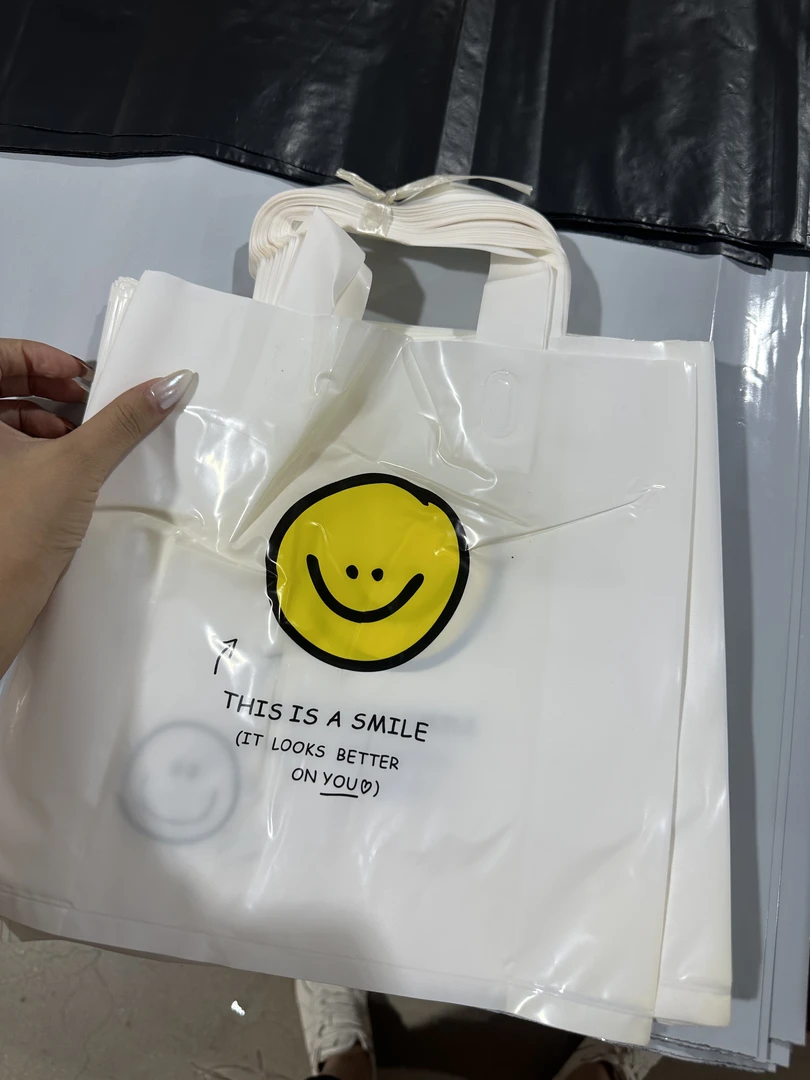 笑脸(微瑕)27小号塑料袋服装店手提袋子卡通礼品袋购物袋