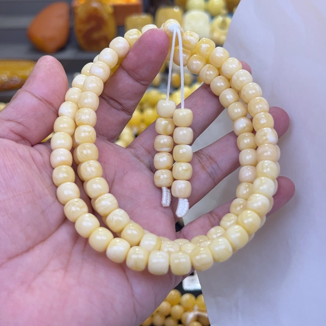 华***诺蜜蜡未镶嵌珠宝奇石9加52.75克