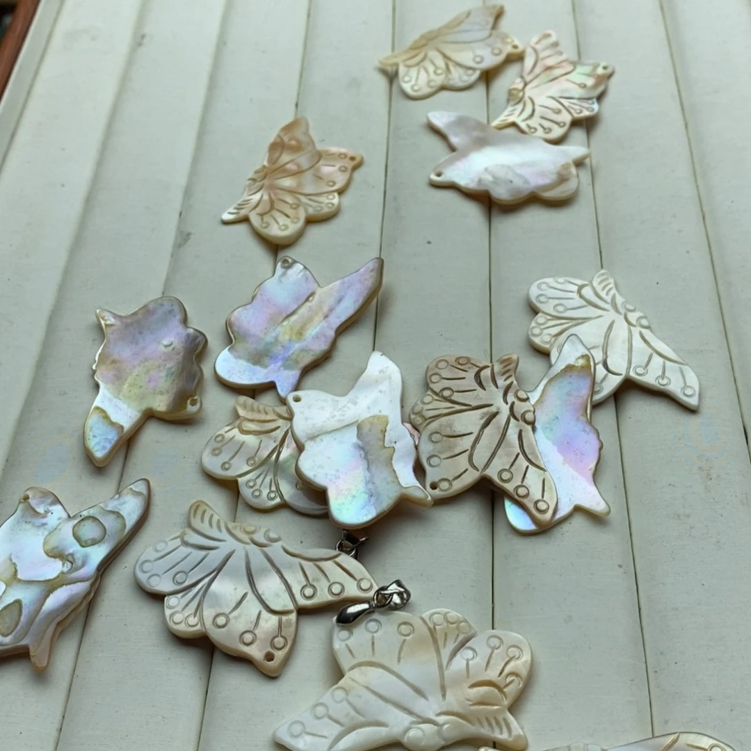 玛瑙/玉髓未镶嵌珠宝半成品一个天然贝壳雕刻蝴蝶F110