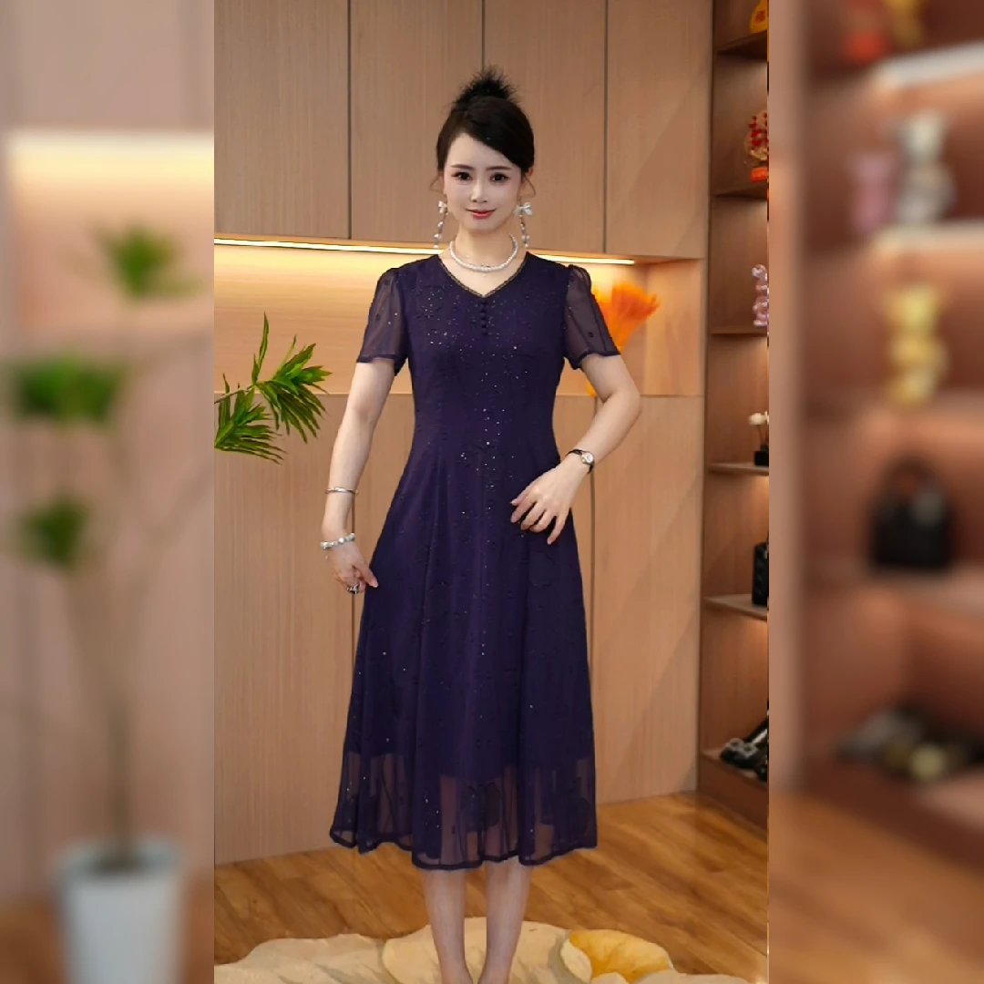 2025夏季新款连衣裙中长裙印花显瘦时尚短袖款洋气复古遮肉{N