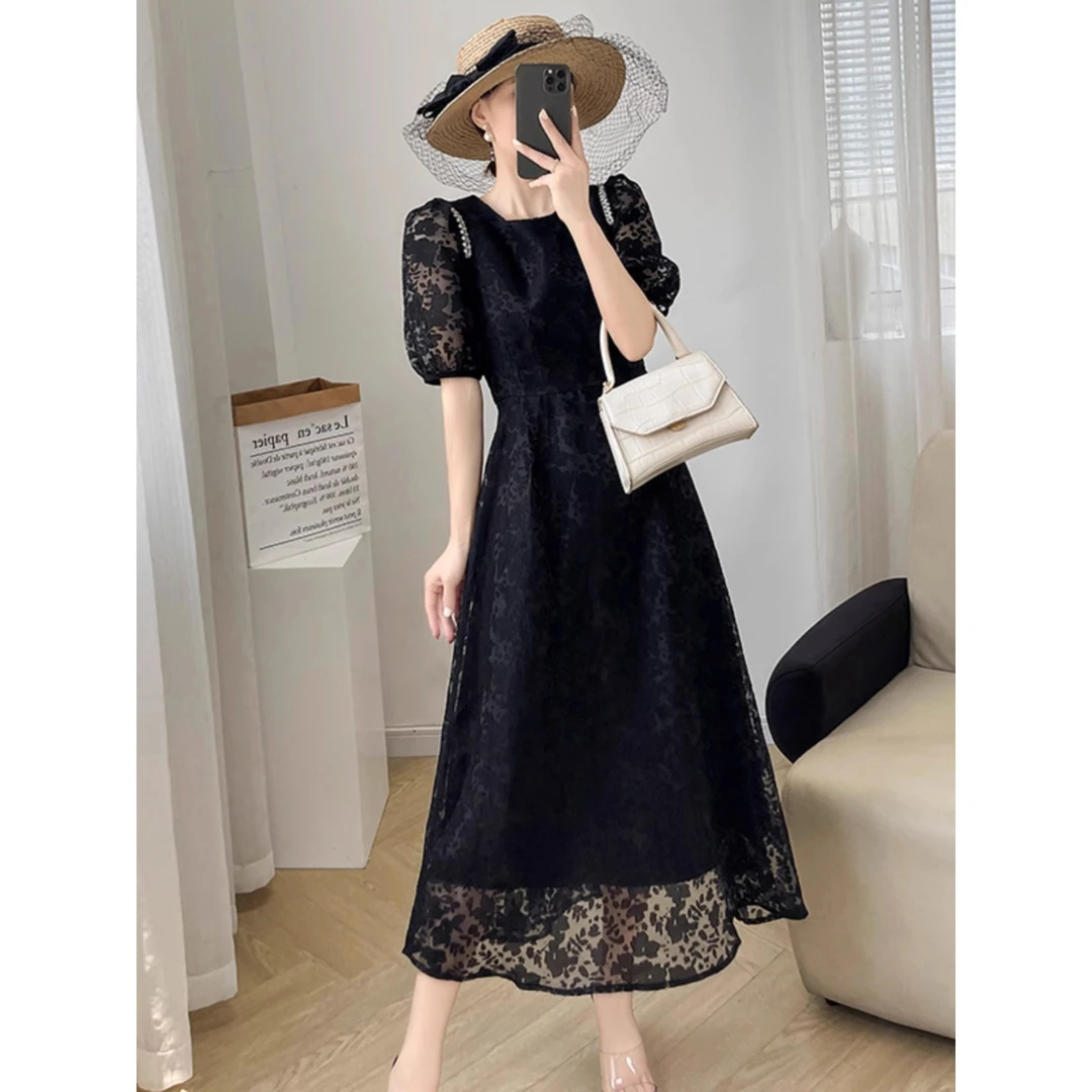 黑色高级感气质连衣裙女夏季2025新款收腰显瘦设计感减龄遮肚长裙
