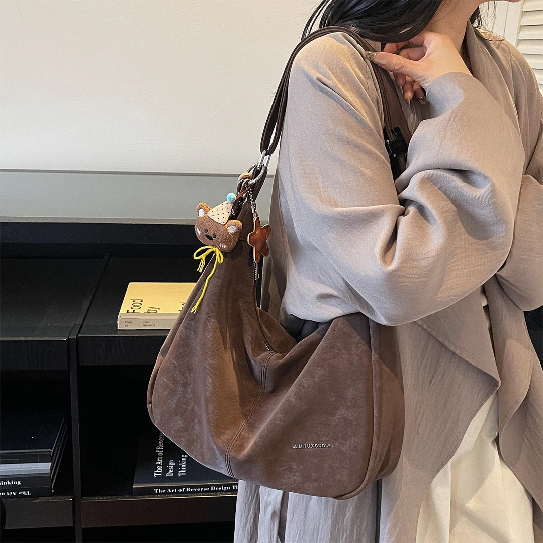 艾米兔女包2025新款大容量时尚复古纯色手提包简约洋气单肩斜挎包