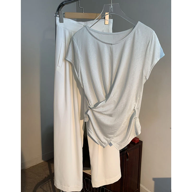 不规则正肩短袖T恤女2025夏季流行单品设计感纽扣收腰小飞袖上衣