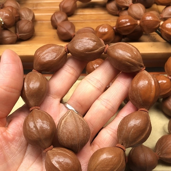 李***岑橄榄核手串梅林铁核21 X28特价