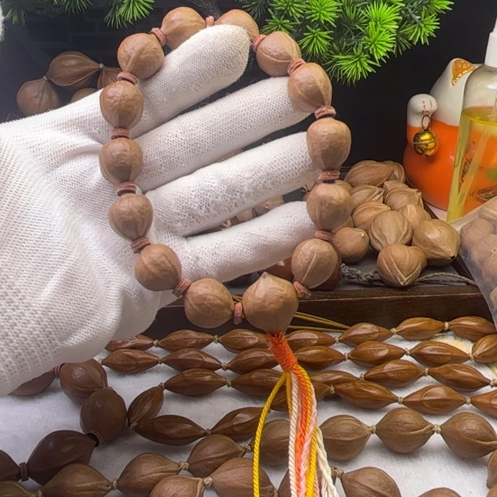 A***7手串/手链橄榄核1.4*1.7原皮三花铁核