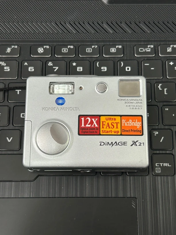 9新  美能达x21 银色 特价 复古ccd数码相机 五号电池款