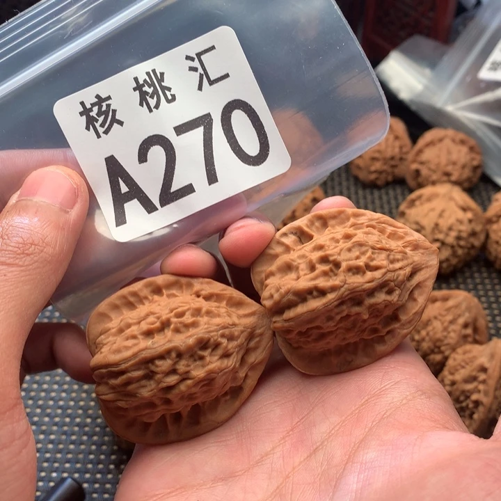 吊坠文玩核桃四眼鸡心
