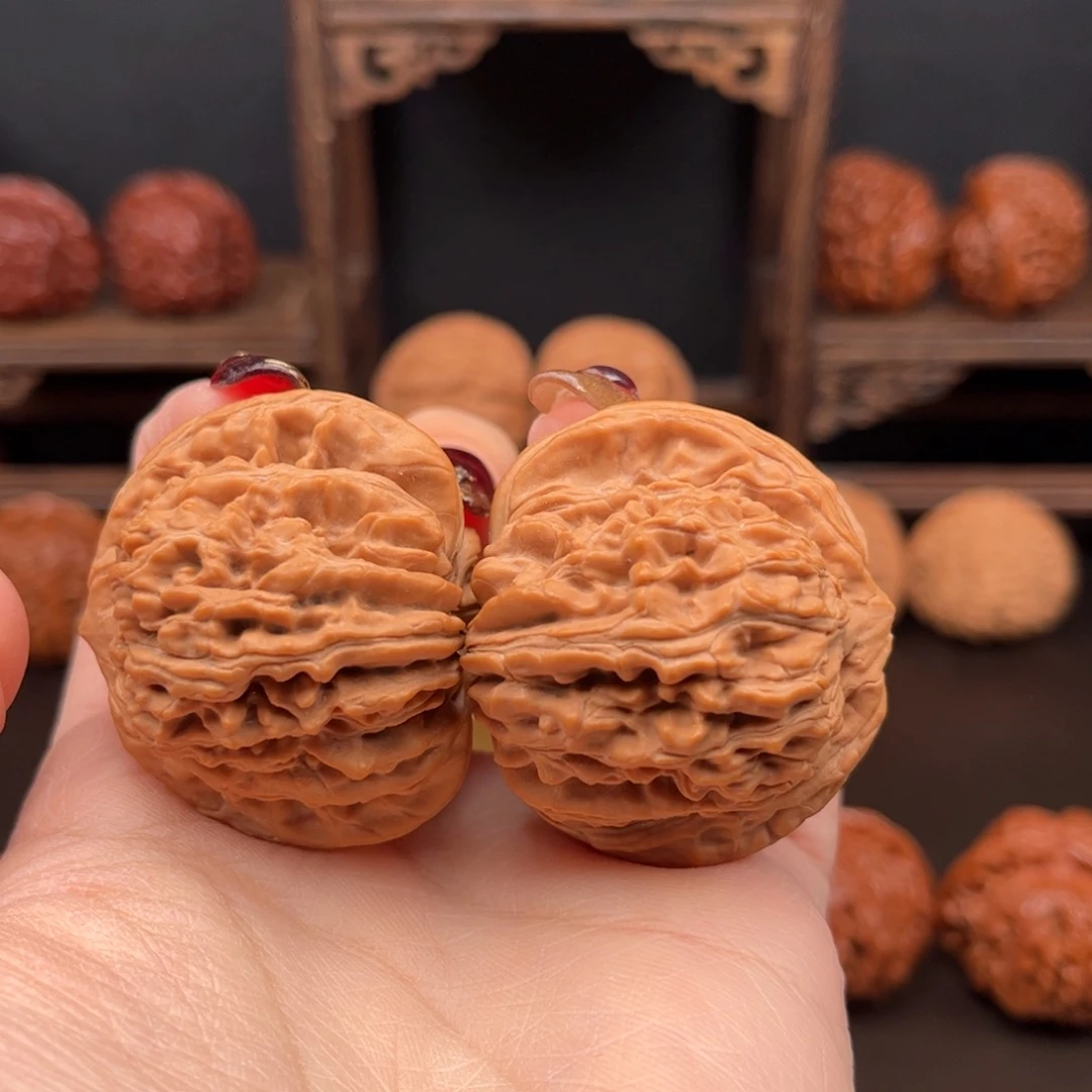 桃核把件?****子平谷一代四座楼