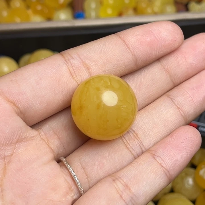 蜜蜡未镶嵌珠宝奇石鸡油黄满蜡妖花圆珠 微瑕