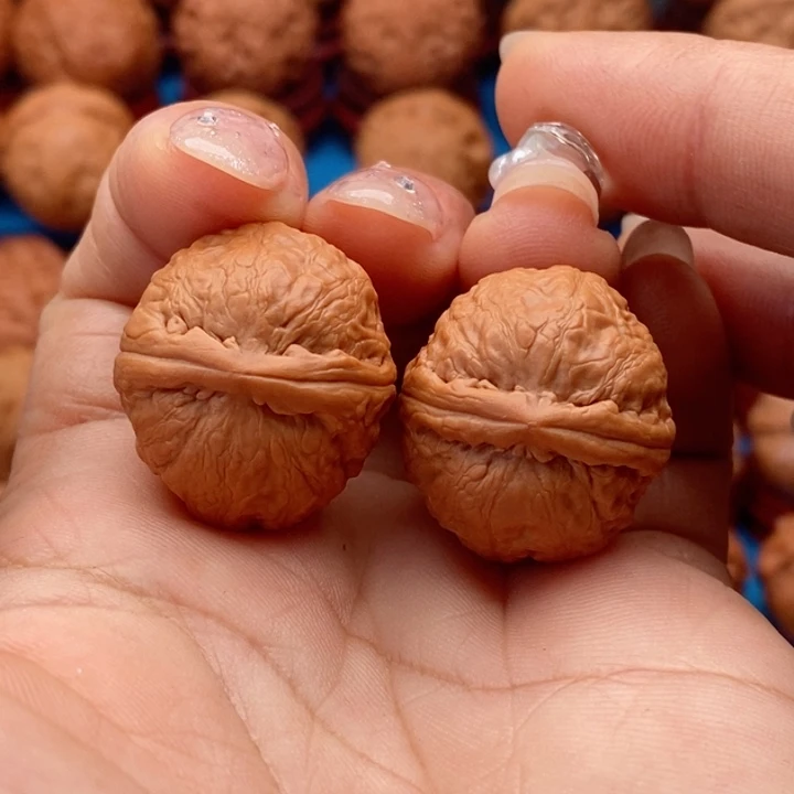 文玩核桃把件精品文玩手捻红豆