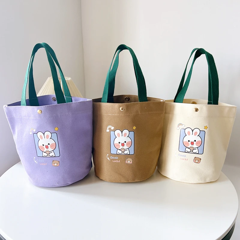 新款卡通水桶包手提包小兜子手提袋便当包时尚饭盒包卡通休闲包