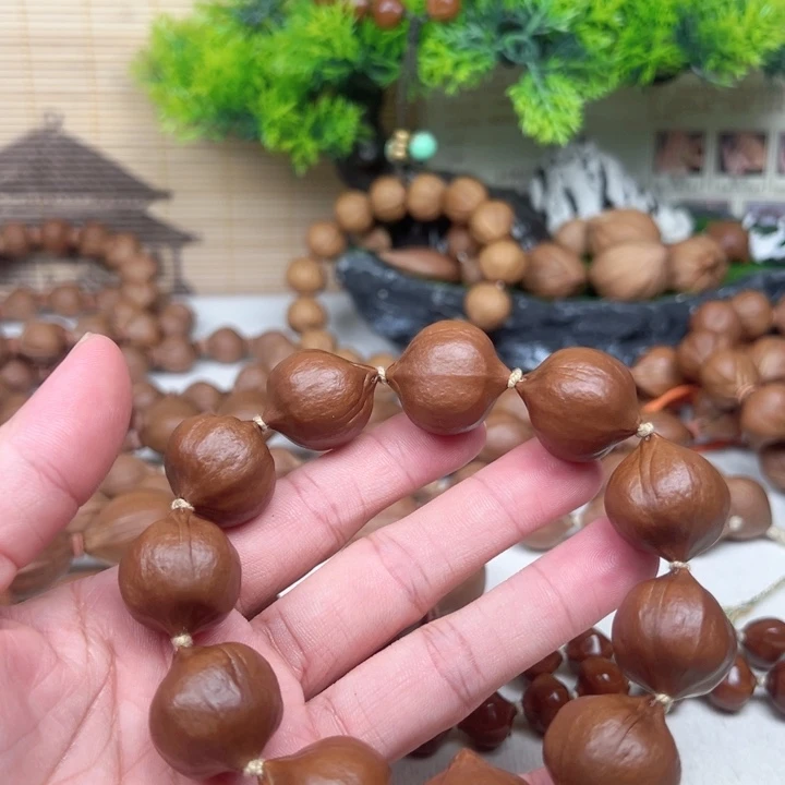 孔***超吊坠橄榄核2122素核