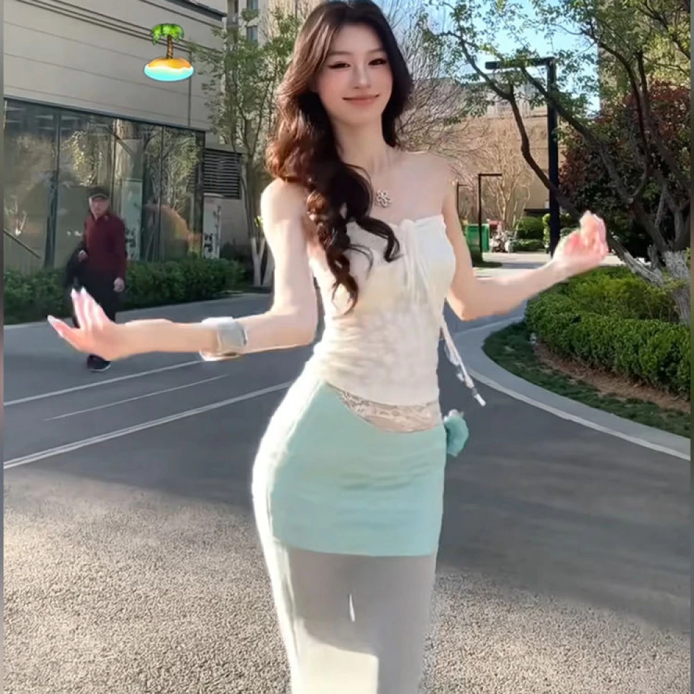 纯欲度假风白色抹胸挂脖上衣女2025夏季新款网纱包臀半身裙套装