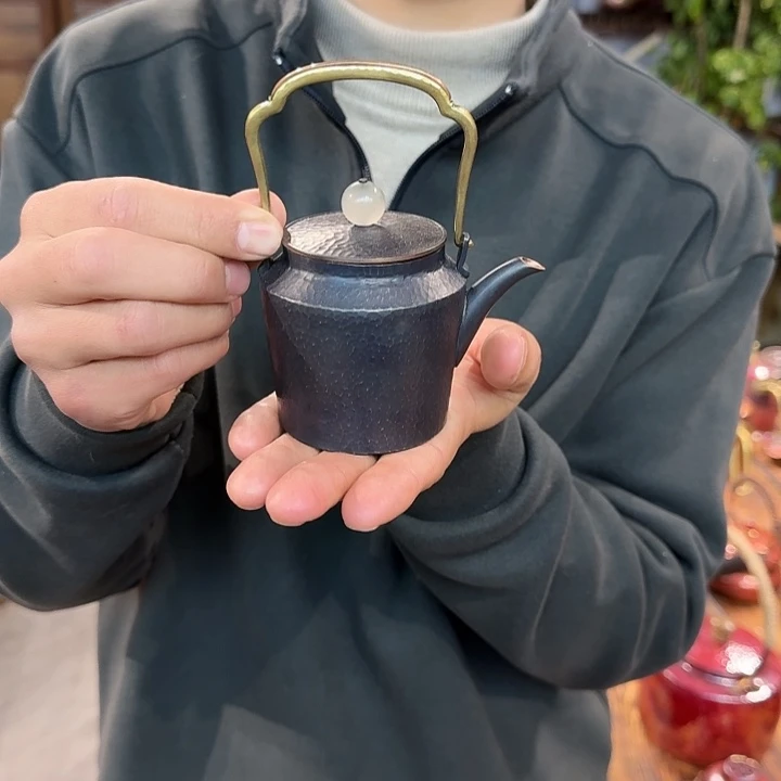 指***沙紫铜手工制作摆件一个