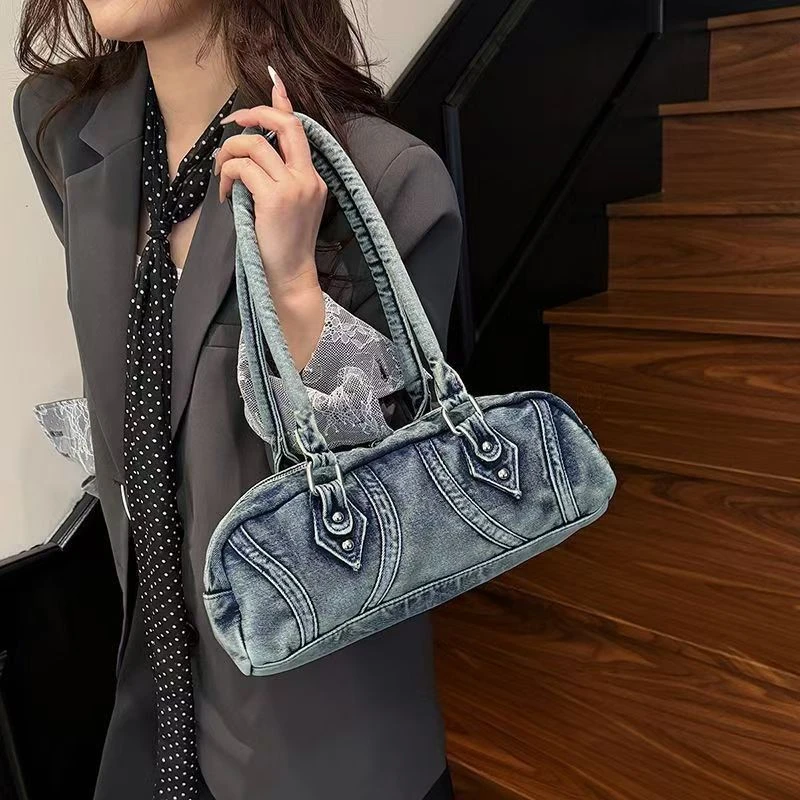 新款牛仔布背包少女手提枕头包小众百搭学生单肩腋下包辣妹法棍包