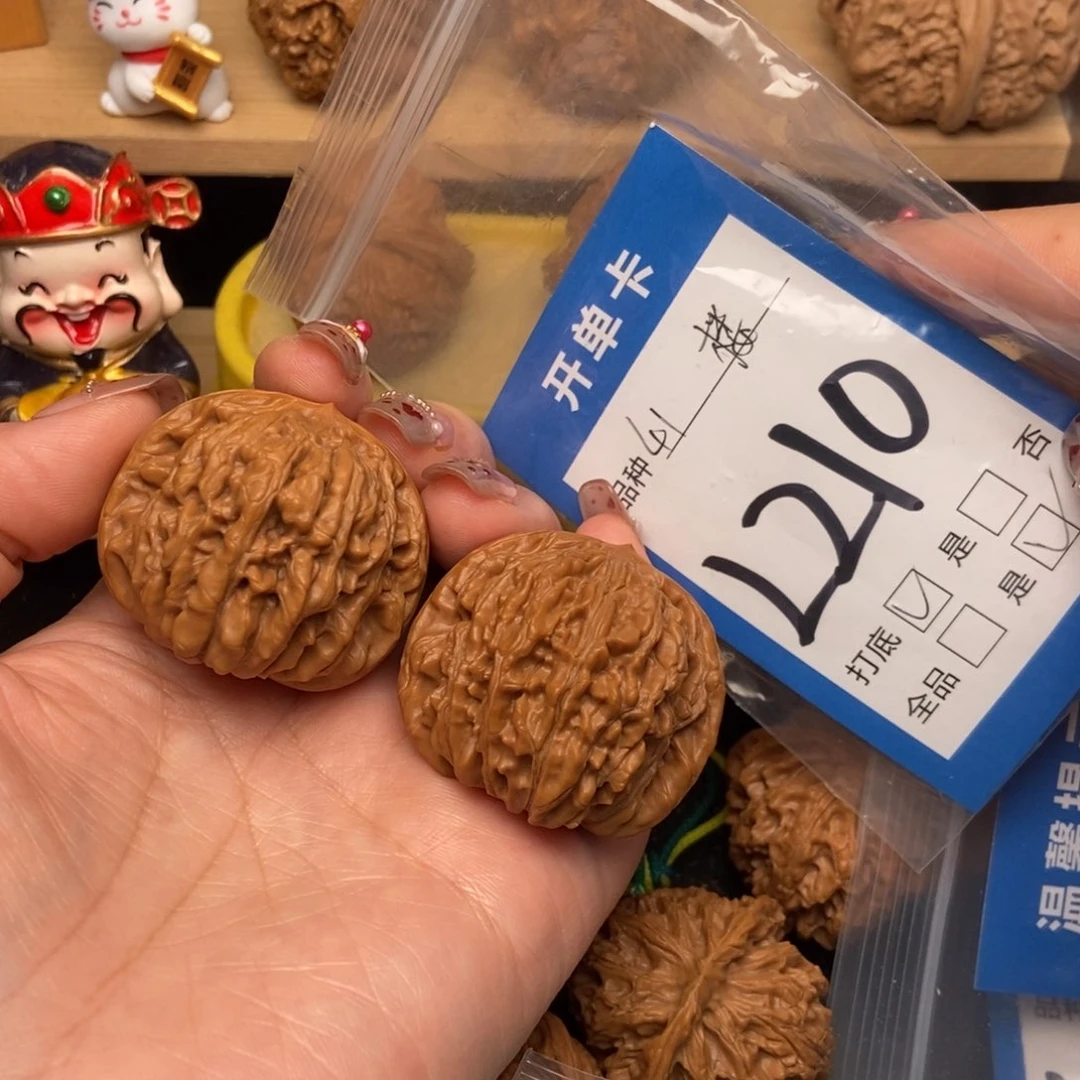 桃核吊坠粥**铺核桃四座楼狮子头