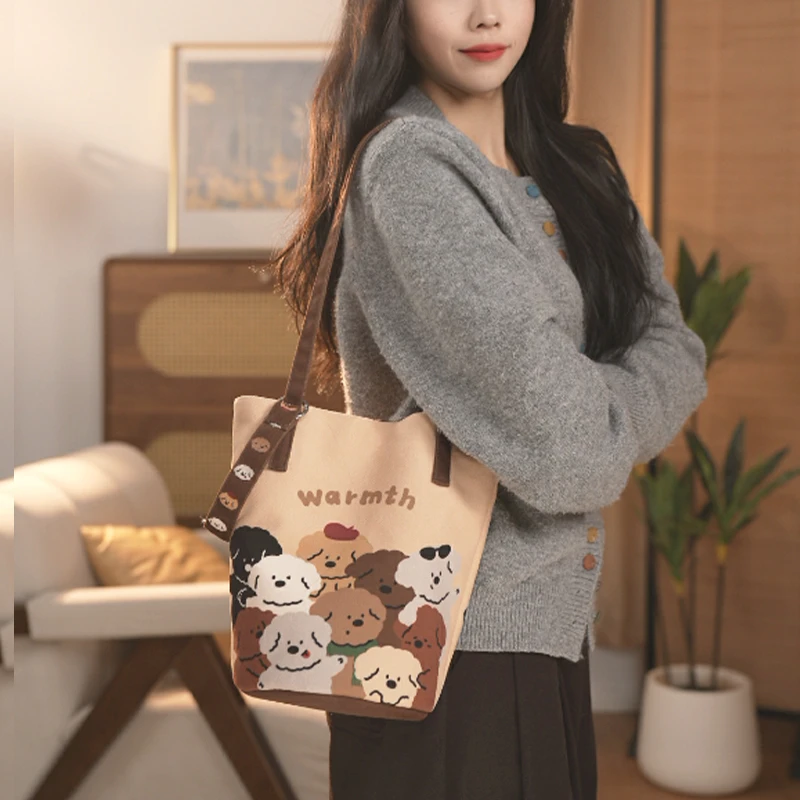 弘娜设计师原创新款百搭通勤手提斜跨水桶包个性单肩包布包女包AI