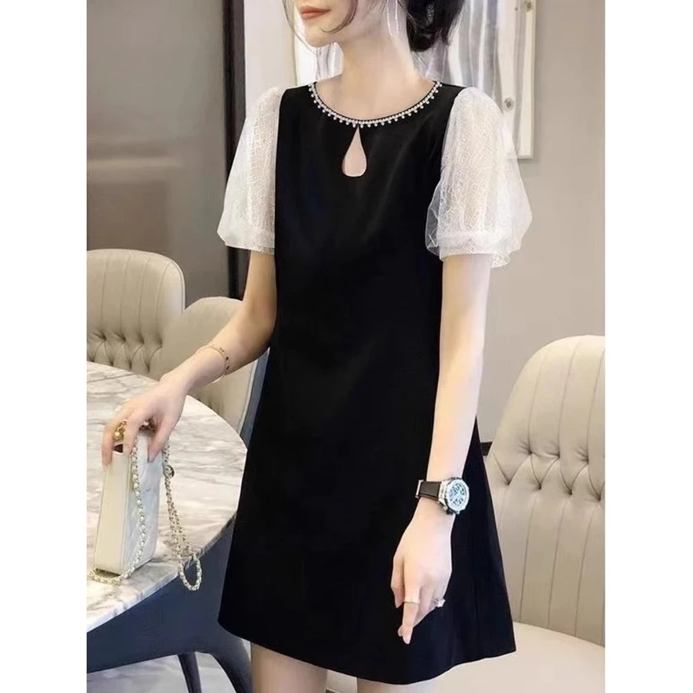 千金风清冷感精致小黑裙女2025夏季新款轻奢气质时尚中长款连衣裙