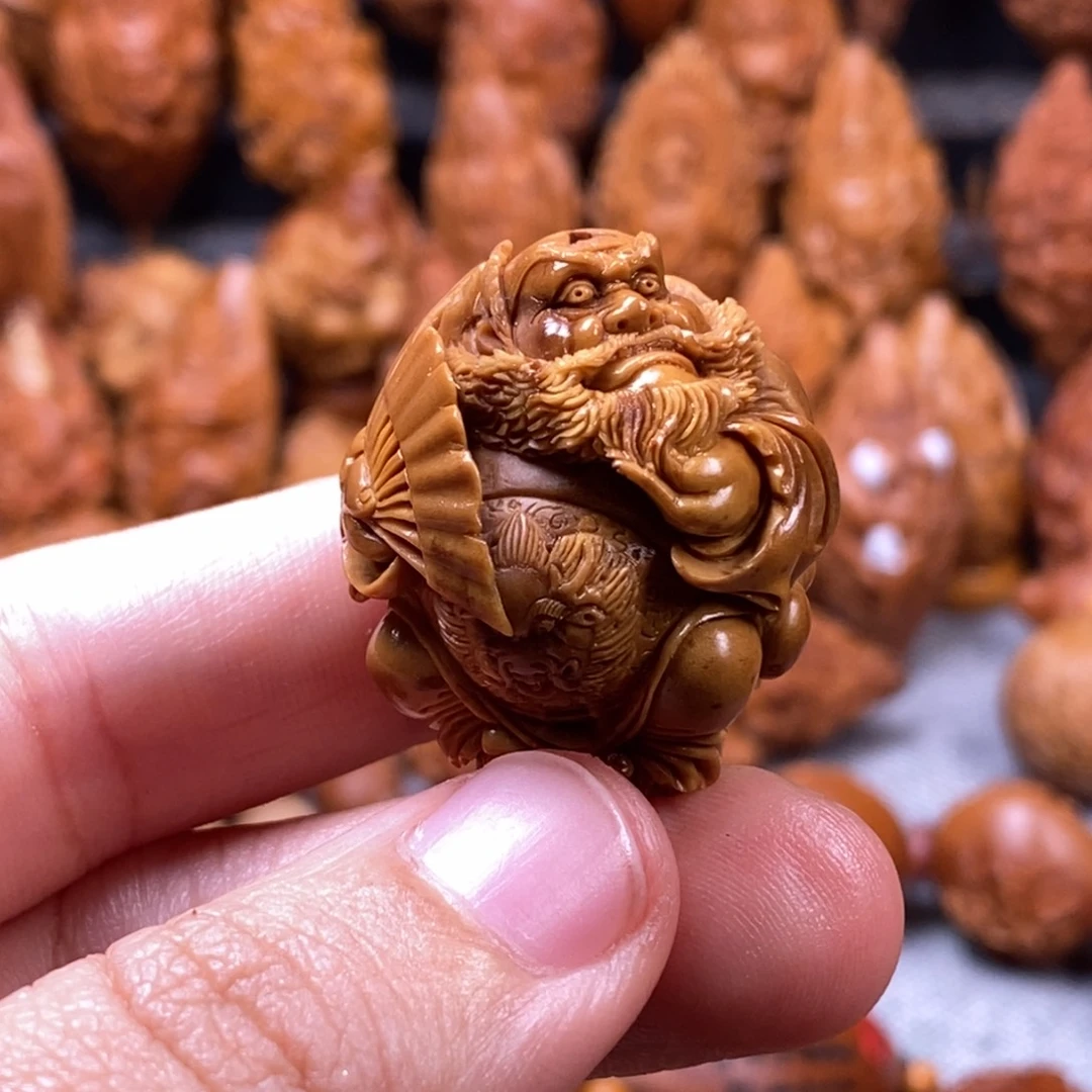 吉***业手串/手链橄榄核核雕