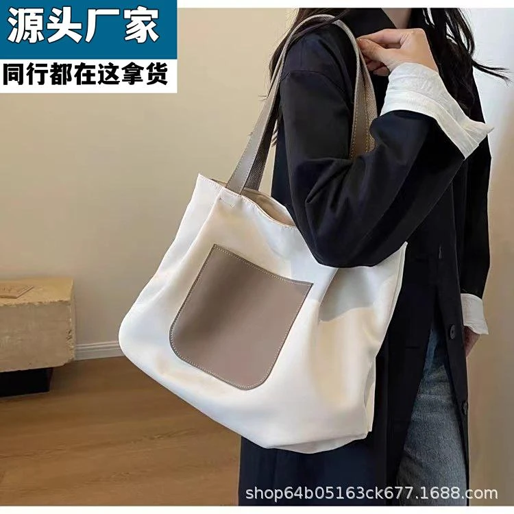 休闲大容量帆布包包女2025新款简约百搭通勤单肩包轻便