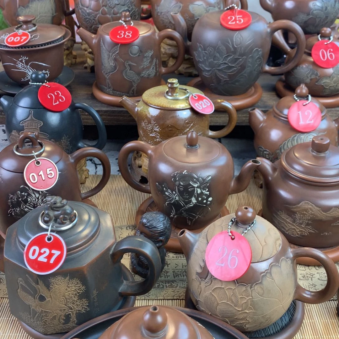 彬**礼坭兴陶手工刻绘山水壶