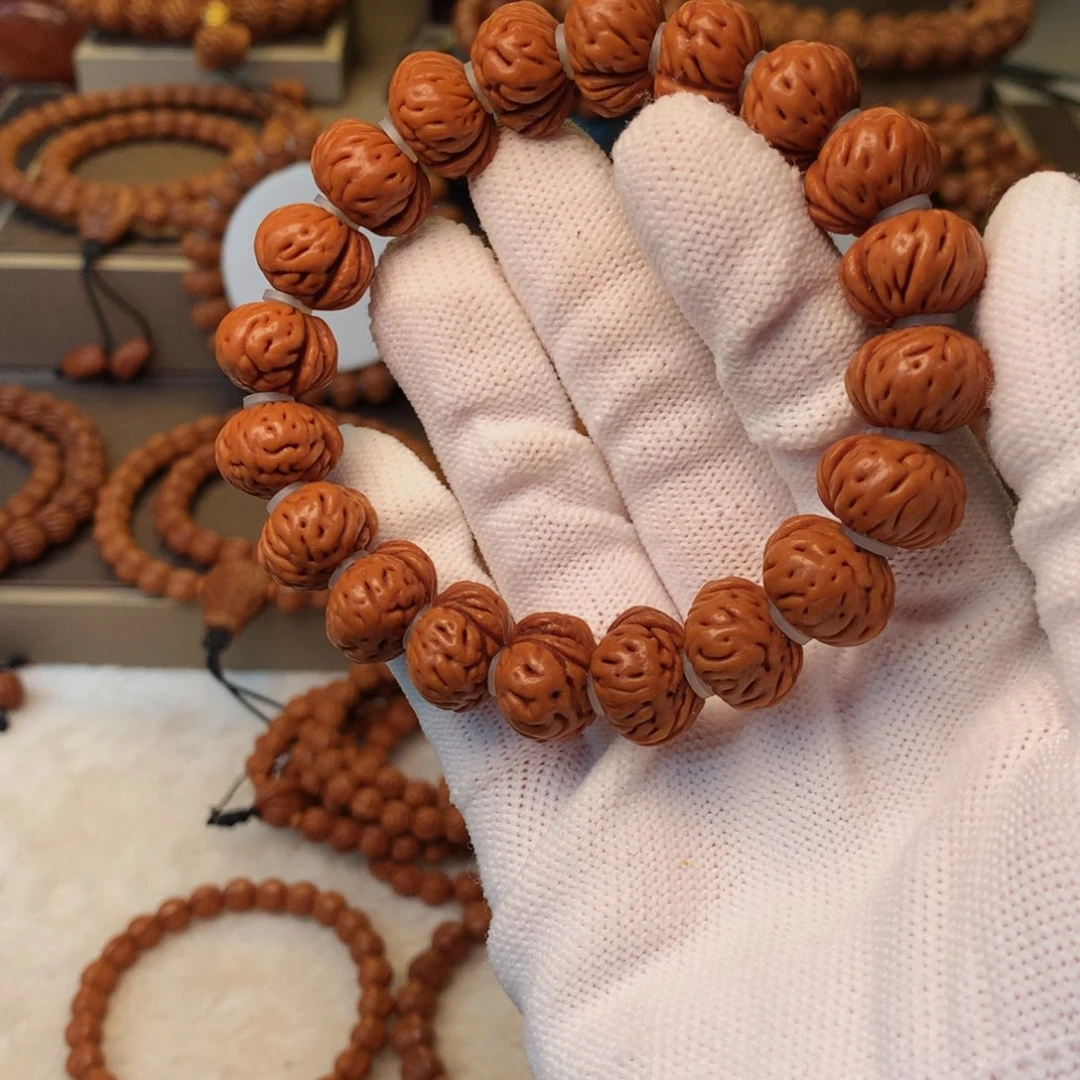 辉***歌桃核手串秦岭龙纹