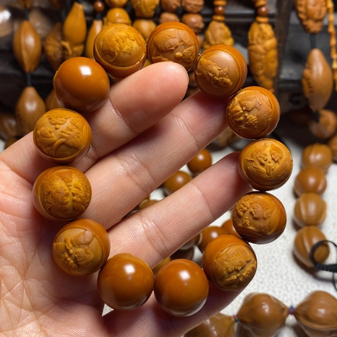 '***.橄榄核吊坠光珠一念