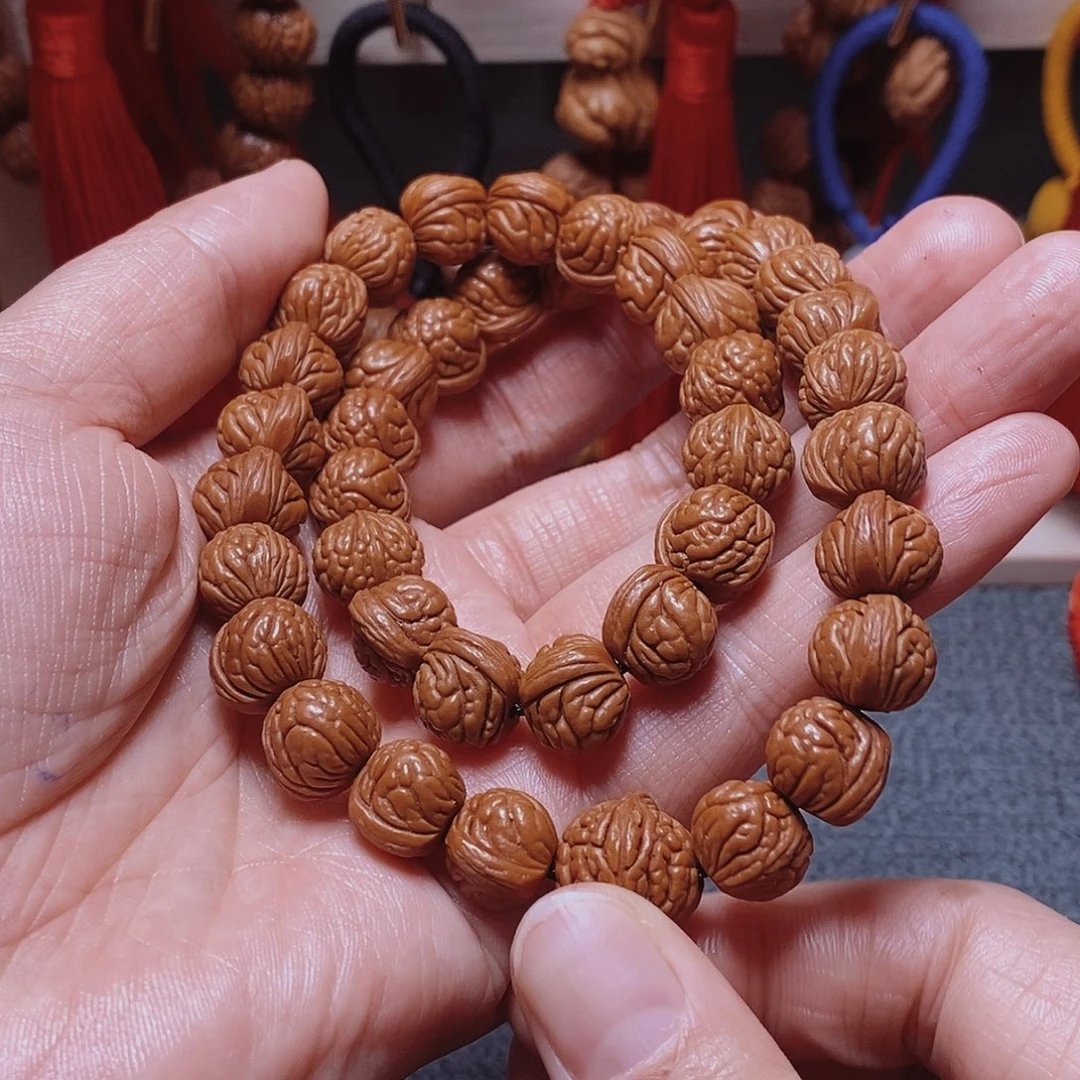 桃核吊坠桃枭手持