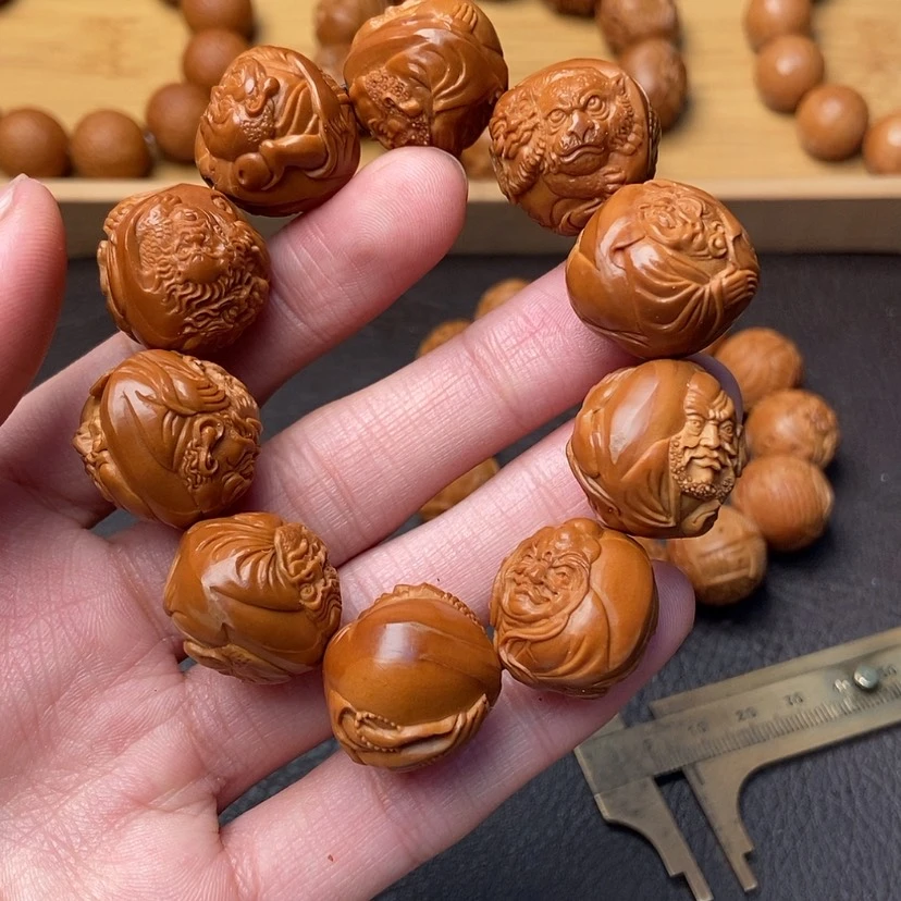 【闪购商品】橄榄核吊坠重****怀橄榄核