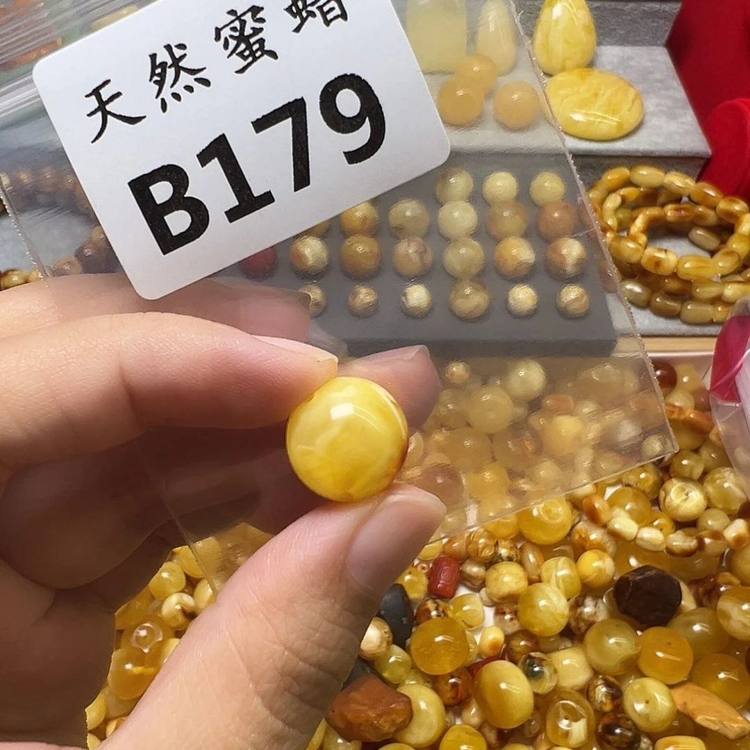 黑***星蜜蜡未镶嵌裸石179号，14.5mm