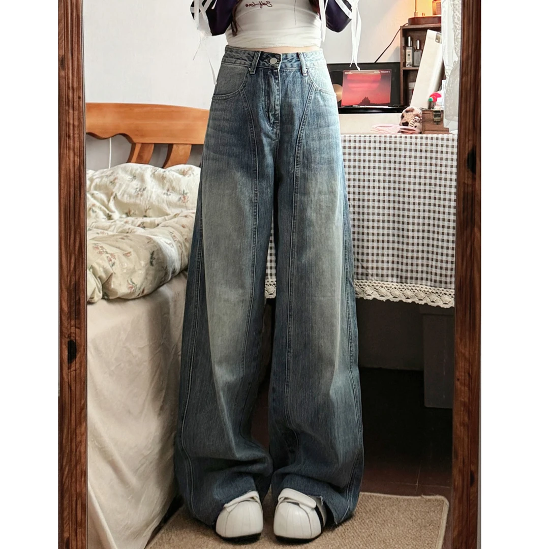秋季新款宽松复古蓝拼接弯刀裤女毛边设计感阔腿牛仔裤拖地裤显瘦